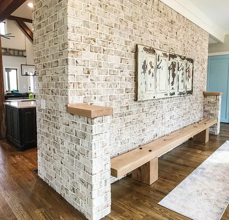 Thin brick accent wall in a dining room
