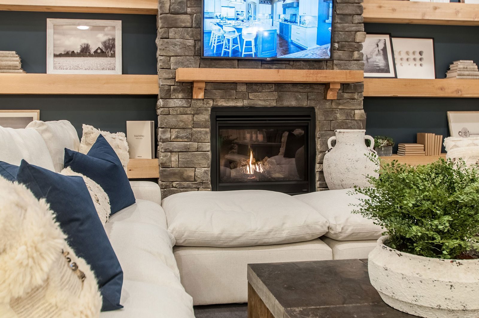 Living room fireplace with a stone surround