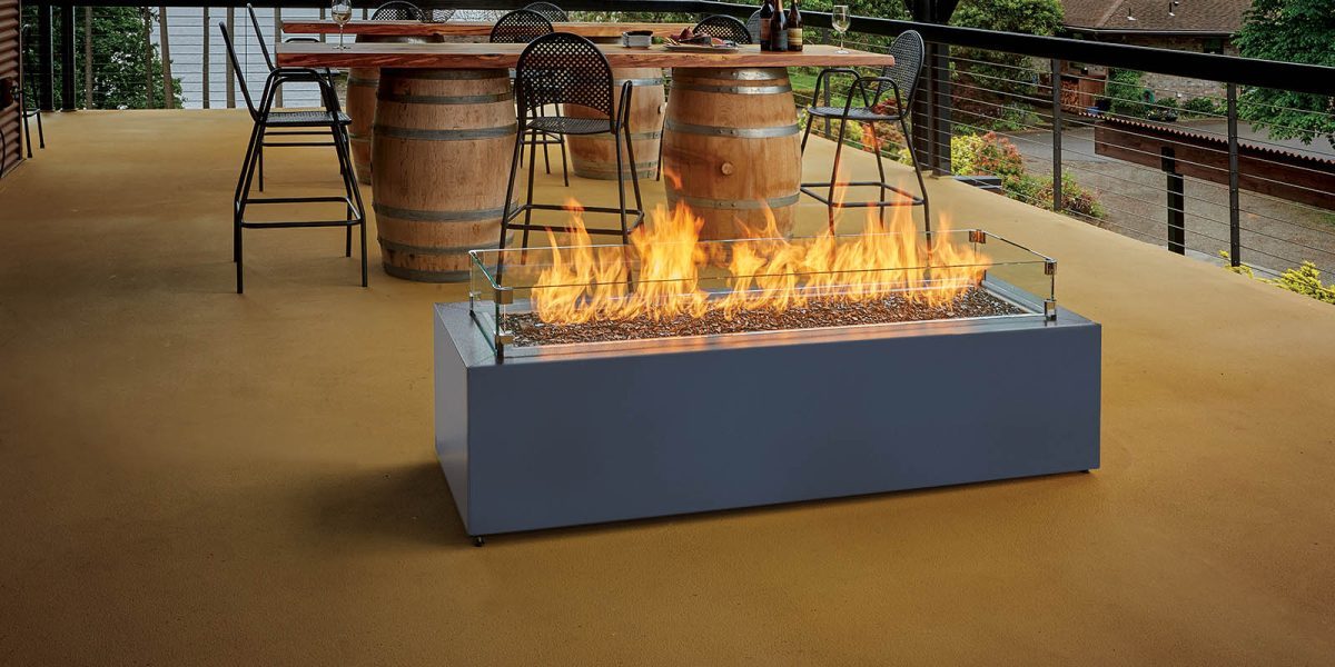 Linear gas fire pit installed on a patio