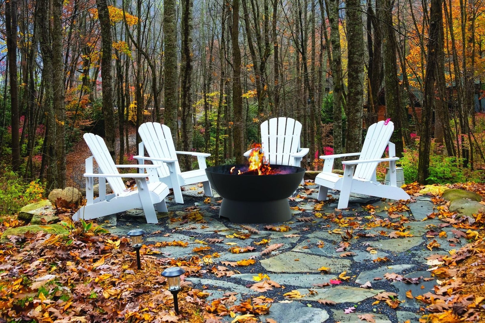 Fire pit with seating on a stone patio