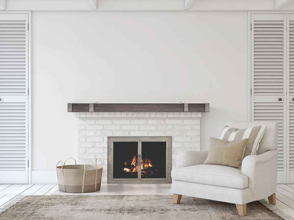 White custom mantel around a gas fireplace